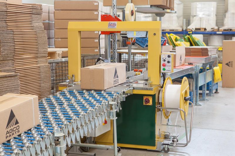 Automatische Verklebung und Umreifung (Kombimaschine) Automatische Verklebung und Umreifung (Kombimaschine)